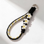 Braid & Carry wide statement braided phone strap in Dark Bloom with oversized daisy charm - Rove Cord
