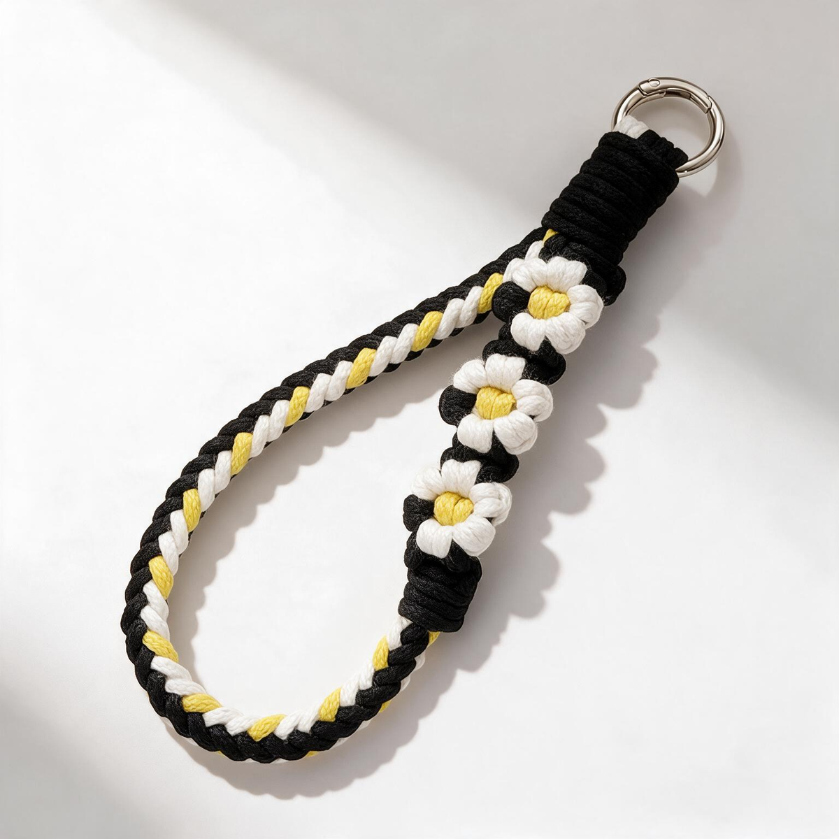 Braid & Carry wide statement braided phone strap in Dark Bloom with oversized daisy charm - Rove Cord
